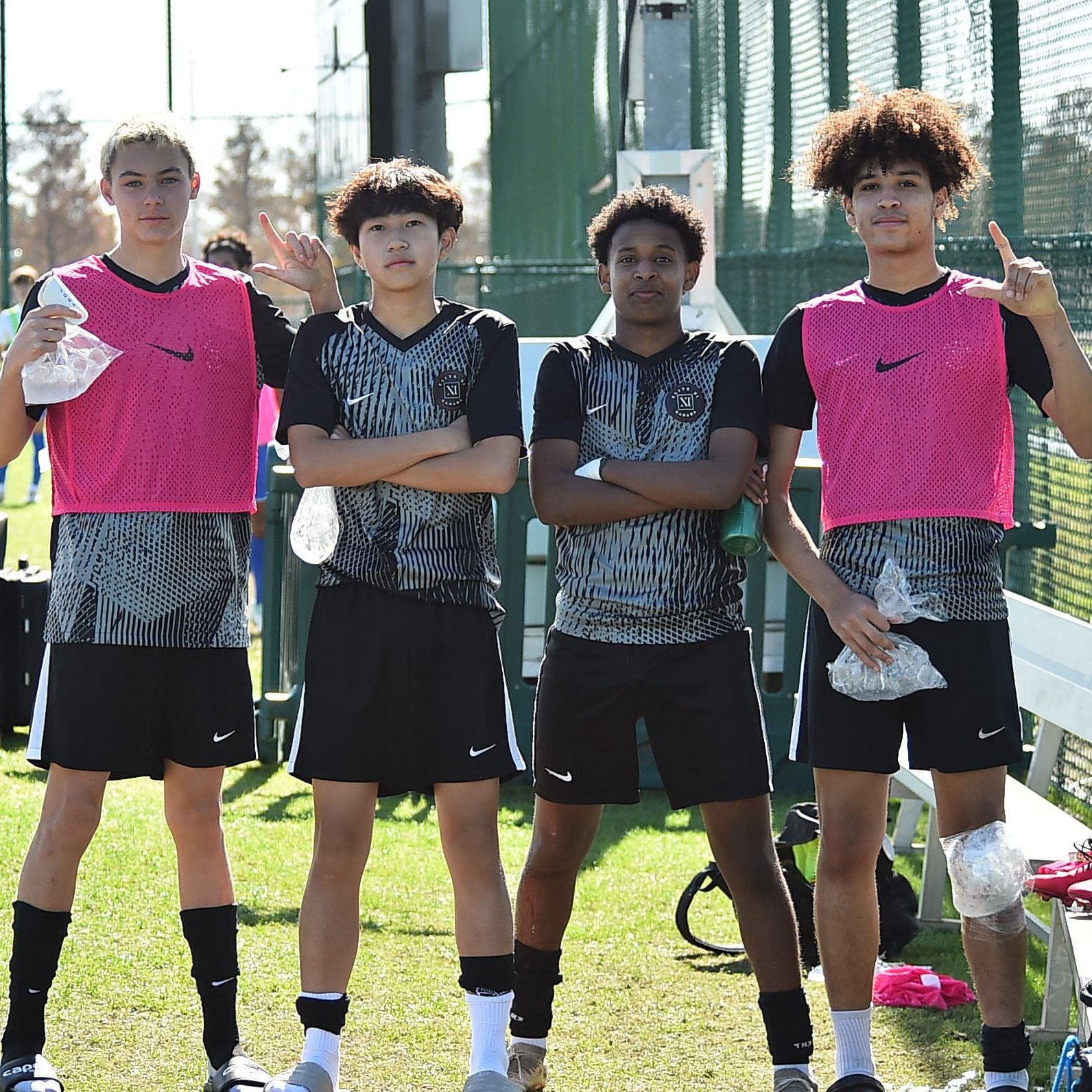 Four Elite XI Canada teammates together on the training pitch